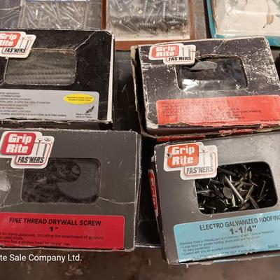 Assortment of hardware still in the boxes / tubs