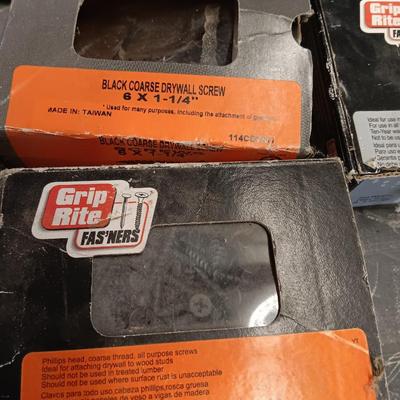 Assortment of hardware still in the boxes / tubs