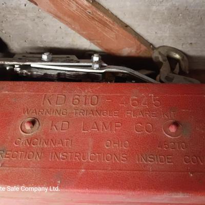 Come a long and tire iron / pry bar with orange safety triangles in a storage box