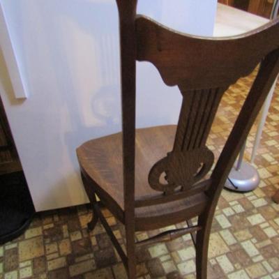 Vintage Solid Wood Chair with Carved Bust Finials
