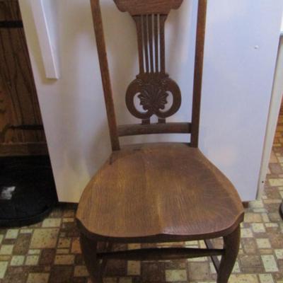 Vintage Solid Wood Chair with Carved Bust Finials