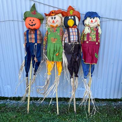 511 Lot of Scarecrow Figures on Bamboo Poles
