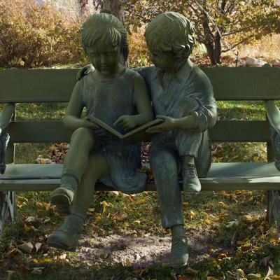 Cast Aluminum ` Sculpture of Children on a Bench 