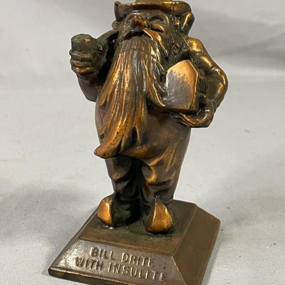 Bill Drite with Insulite Copper Clad Man Advertising Paperweight