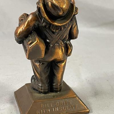 Bill Drite with Insulite Copper Clad Man Advertising Paperweight