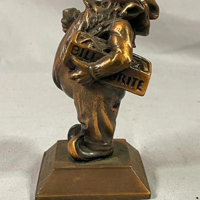 Bill Drite with Insulite Copper Clad Man Advertising Paperweight
