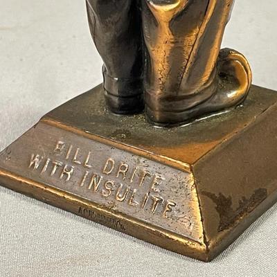 Bill Drite with Insulite Copper Clad Man Advertising Paperweight