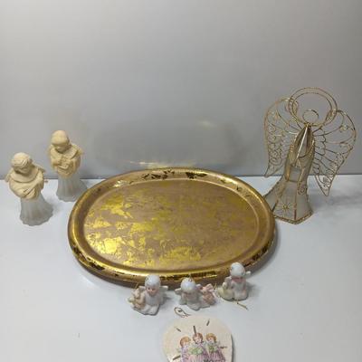 Collection of vintage Angels and a gold-colored oval platter.