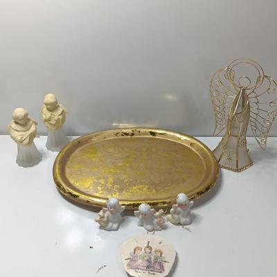 Collection of vintage Angels and a gold-colored oval platter.