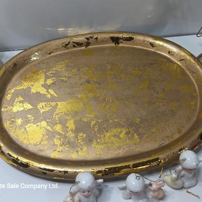 Collection of vintage Angels and a gold-colored oval platter.