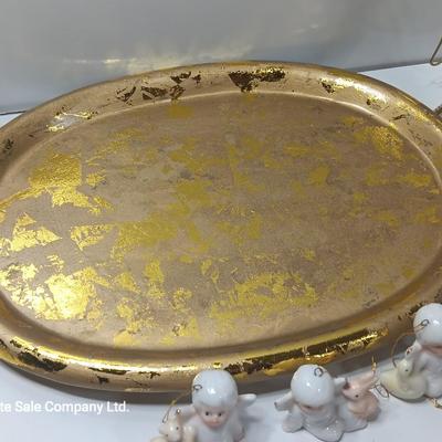 Collection of vintage Angels and a gold-colored oval platter.