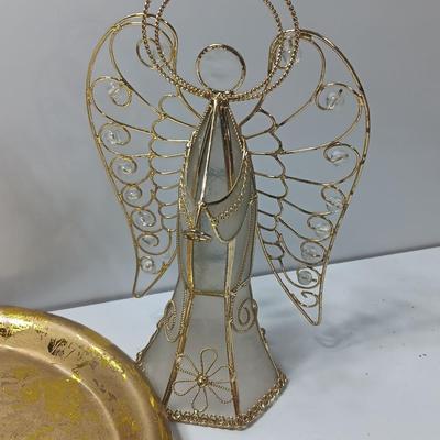 Collection of vintage Angels and a gold-colored oval platter.