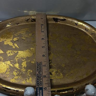 Collection of vintage Angels and a gold-colored oval platter.