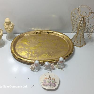 Collection of vintage Angels and a gold-colored oval platter.
