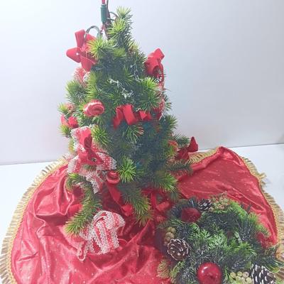Faux Christmas tree with ornaments and bows - tree skirt and Plastic greenery