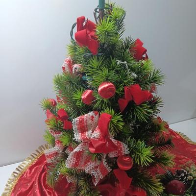 Faux Christmas tree with ornaments and bows - tree skirt and Plastic greenery