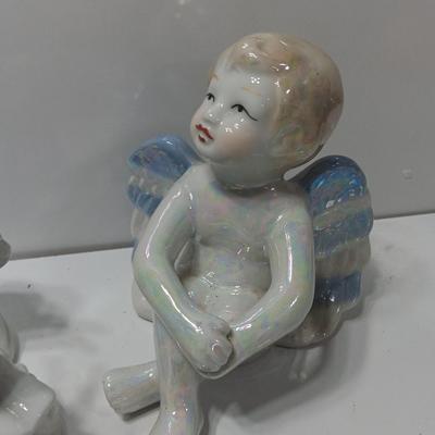 Two Vintage Gorgeous Iridescent Rainbow Angels and a trio of Angels candle holders