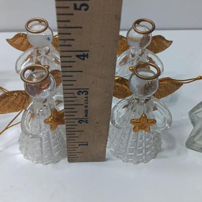 Clear plastic Angel light covers with Angel candle holder and Vintage glass tree bottle