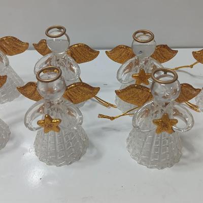 Clear plastic Angel light covers with Angel candle holder and Vintage glass tree bottle