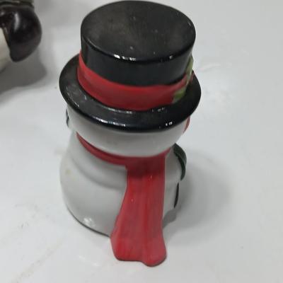Vintage Snowman candle holders and a snowman and snow woman