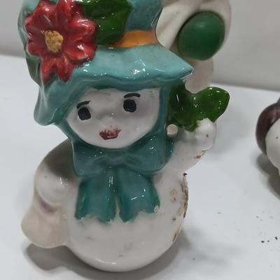 Vintage Snowman candle holders and a snowman and snow woman