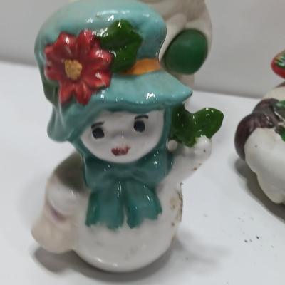 Vintage Snowman candle holders and a snowman and snow woman