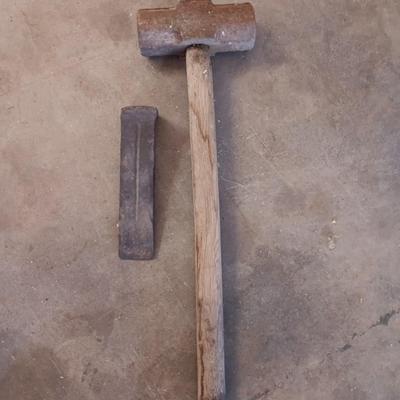 Sledgehammer and splitting wedge.