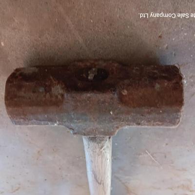 Sledgehammer and splitting wedge.