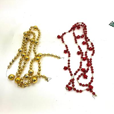 548 Two Sets of 6' Red and Gold Glass Garland