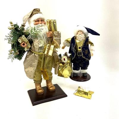 556 Gold and Navy Santa Figures