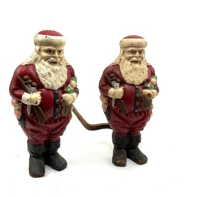 559 Pair of Santa Cast Iron Andirons