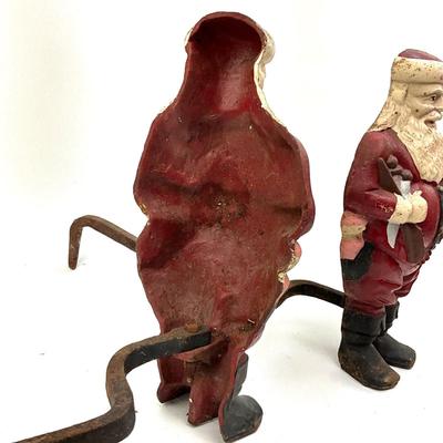 559 Pair of Santa Cast Iron Andirons