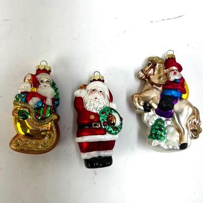 669 Lot of Three Glass Santa Ornaments