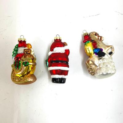 669 Lot of Three Glass Santa Ornaments