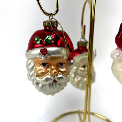 672 Lot of Seven Handblown Glass Santa Face Ornaments