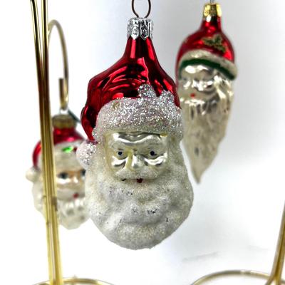 672 Lot of Seven Handblown Glass Santa Face Ornaments