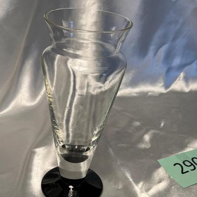 Crystal vase with black foot.