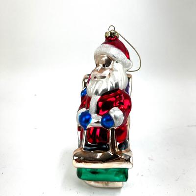685 Large 6" Glass Santa Riding on Sled Ornament