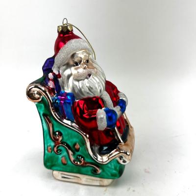 685 Large 6" Glass Santa Riding on Sled Ornament