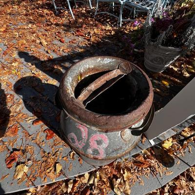 Old Milk Jug with a facet on it