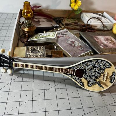 Box of Decorative items: Music Box, Keys etc.