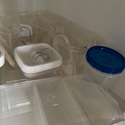 A bunch of Plastic Covered Containers 