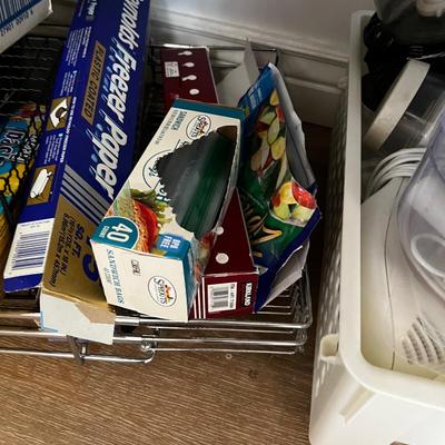Saran Wrap, Foil and Rolling Cupboard Shelf. 