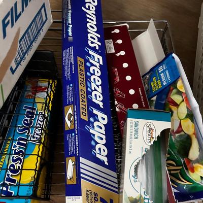 Saran Wrap, Foil and Rolling Cupboard Shelf. 