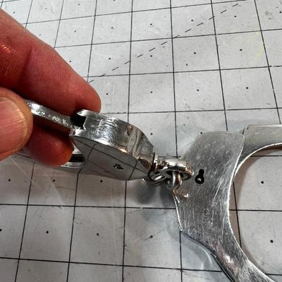 Actual Heavy Hand Cuffs with no key!