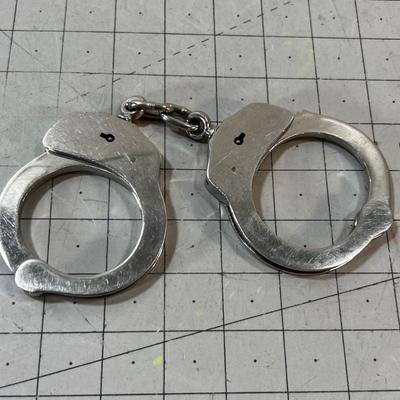 Actual Heavy Hand Cuffs with no key!