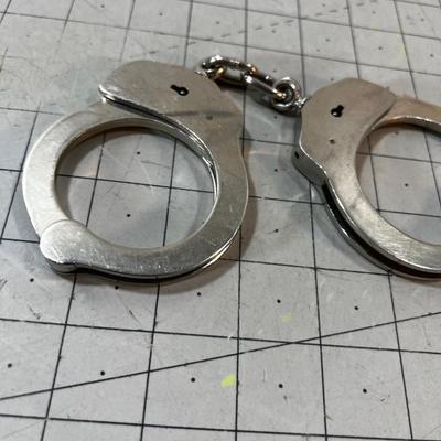 Actual Heavy Hand Cuffs with no key!
