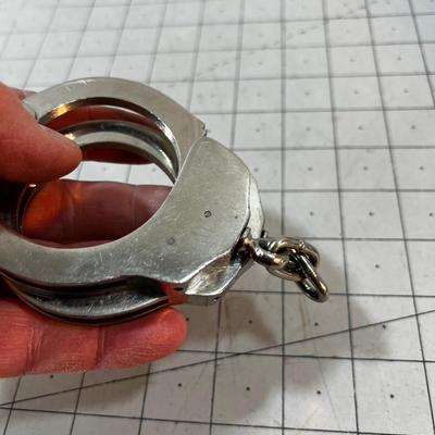 Actual Heavy Hand Cuffs with no key!