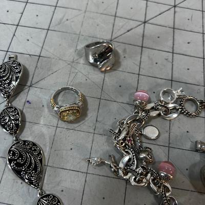 Pile of Lia SOPHIA Rings, Pendants and Bracelets