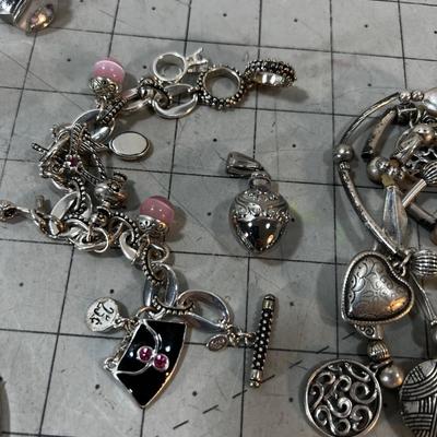 Pile of Lia SOPHIA Rings, Pendants and Bracelets